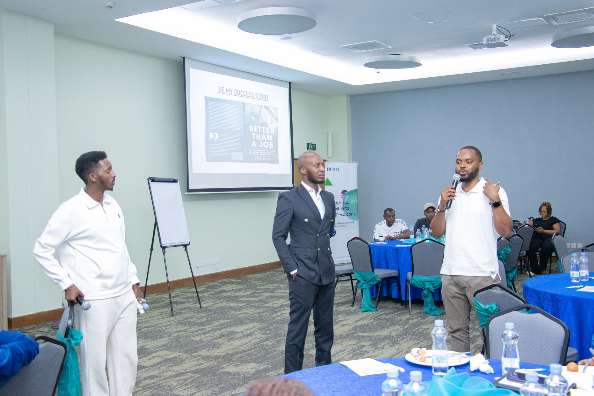 Tim Beya and the Tim Capital team in conversation with guests at an Investor Breakfast